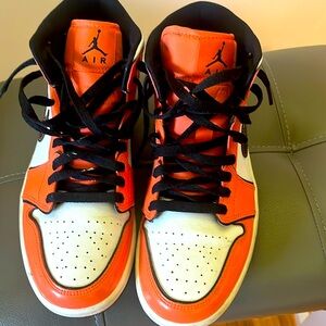 Air Jordan’s, orange and white